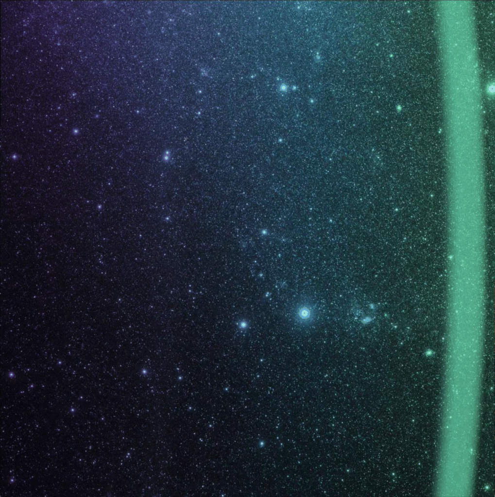 An image of a starry night sky taken by the SPHEREx mission is shown with a purple to green color gradient overlaid.